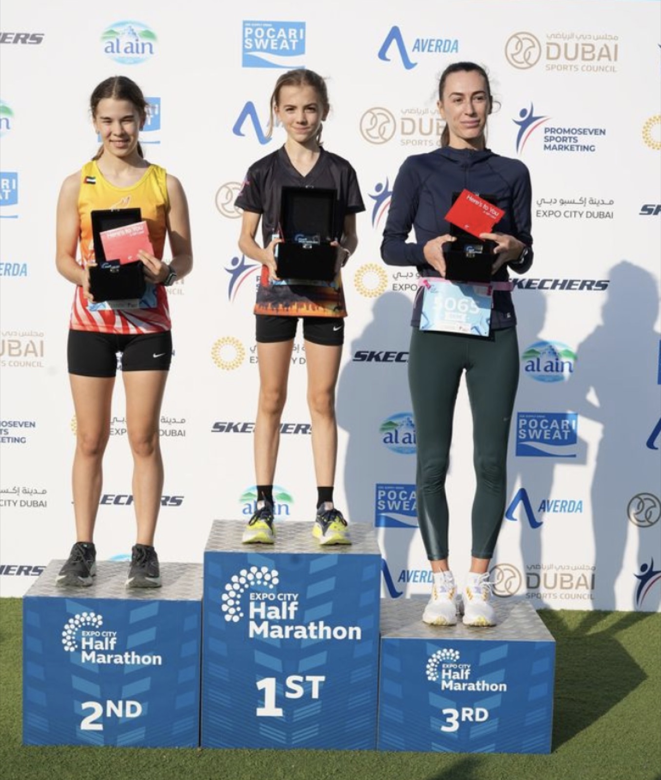 Podium of the Expo City Half Marathon 5 km with Carla on the top step
